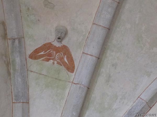 Hole cover in vaulted ceiling of Karja church