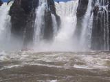 Boat under Iguazu Waterfall