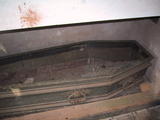 Open Coffin in Abandoned Graveyard