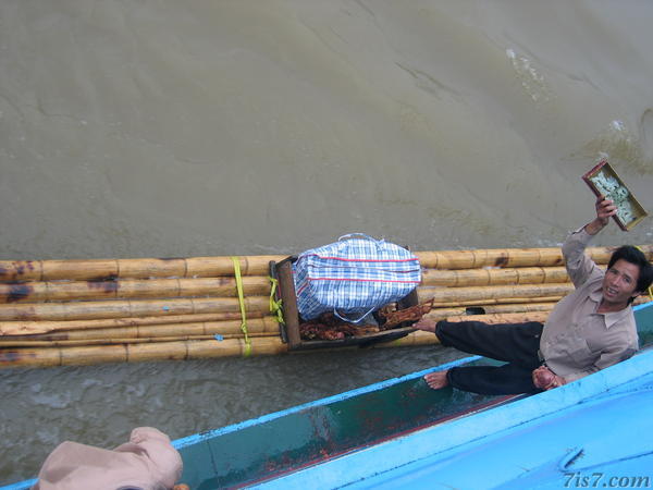 Locals on a Raft Selling Goods